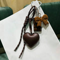 Pingente Decorativo para Bolsas Coração em Couro PU