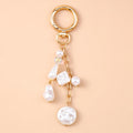Chaveiro Charm Estrela-do-Mar e Conchas