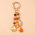 Chaveiro Charm Estrela-do-Mar e Conchas