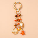 Chaveiro Charm Estrela-do-Mar e Conchas