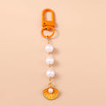 Chaveiro Charm Estrela-do-Mar e Conchas