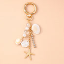 Chaveiro Charm Estrela-do-Mar e Conchas