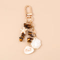 Chaveiro Charm Estrela-do-Mar e Conchas